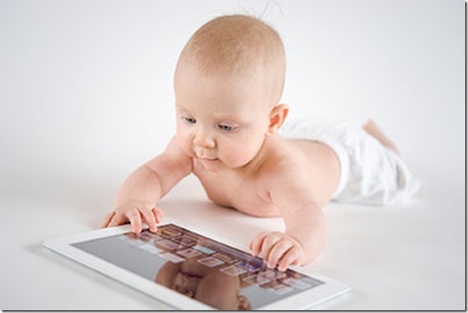 Baby  using a digital tablet